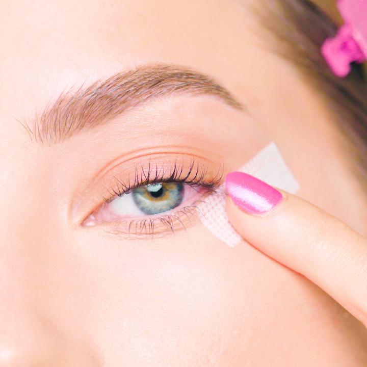 image shows snatched tape being applied to the eye area