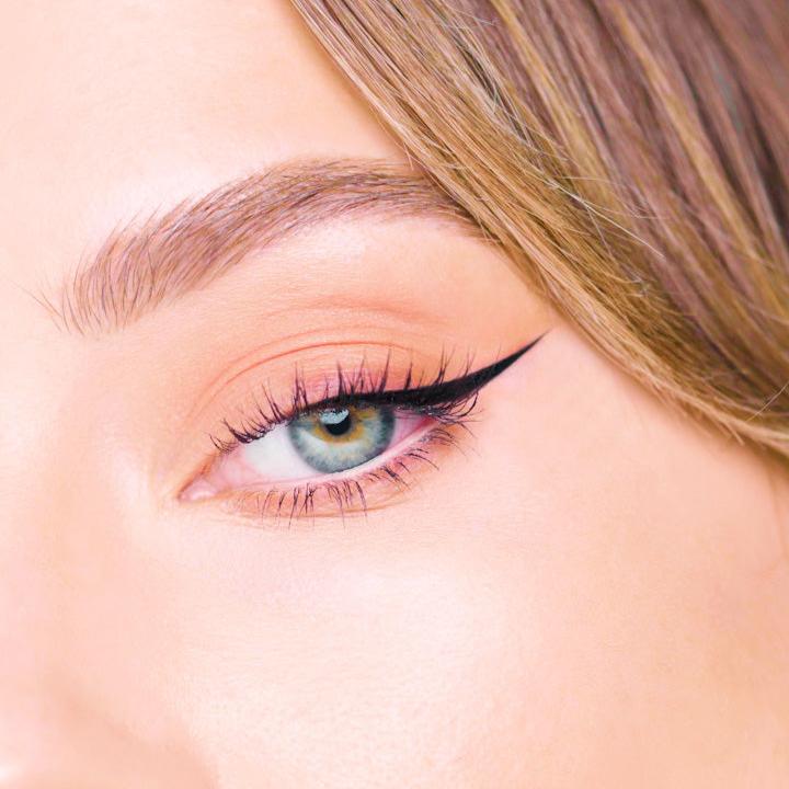 image shows a sharp eyeliner result after using snatched tape